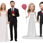 Two wedding cake toppers: a bride in a white dress and a groom in a black suit holding red roses, with a pink balloon nearby