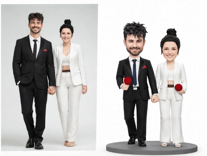 Real couple in black-and-white formal attire, holding hands, shown next to their cartoon bobblehead replicas on a round pedestal with red props, both smiling.