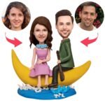Two cartoon couples ride yellow crescent moons on a blue water base, each holding a paddle; woman in lavender dress, man in green jacket.