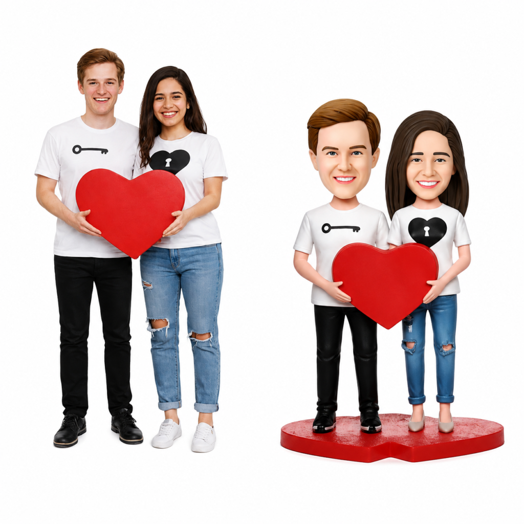 Two smiling people hold a large red heart together, with matching white shirts showing a key and a heart symbol, standing side by side.