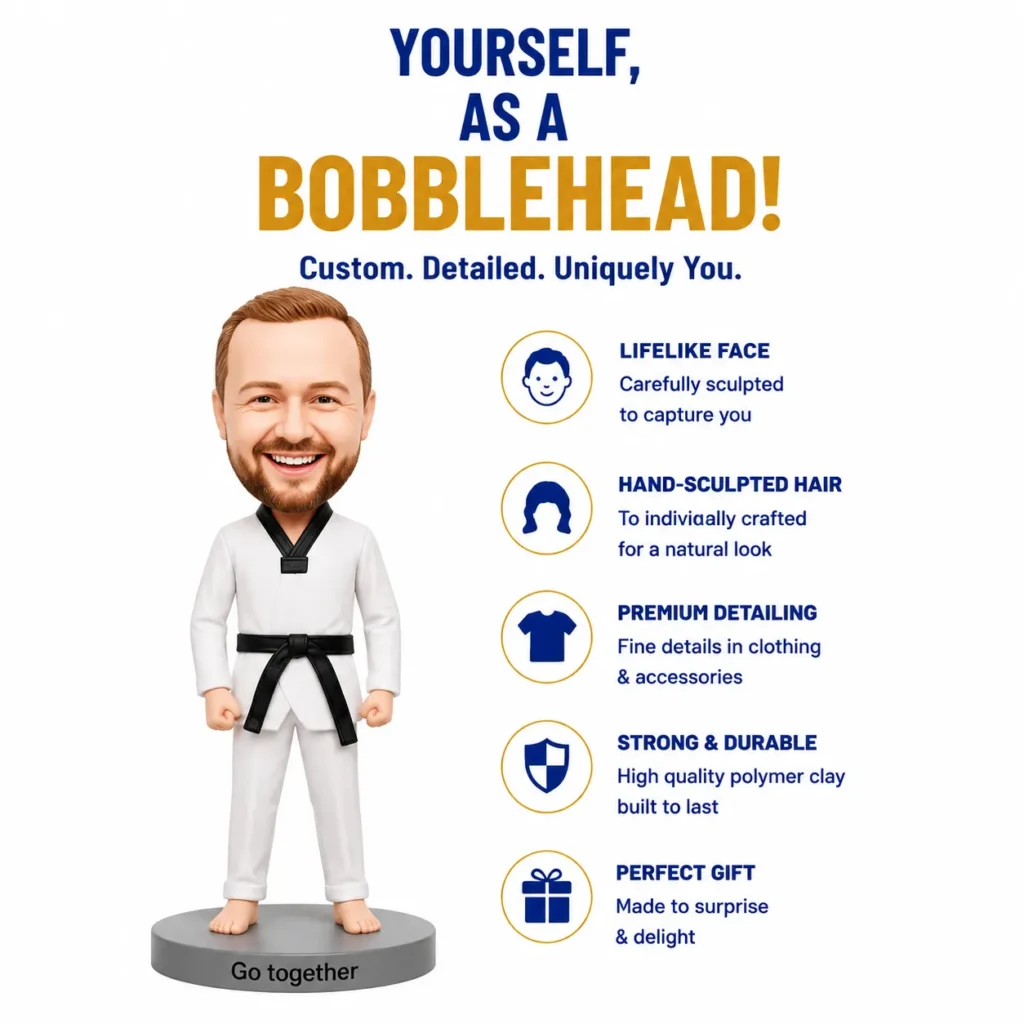 Custom bobblehead in a white martial arts gi with black belt, standing on a gray base