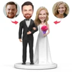 Custom wedding cake topper: bride and groom figurines on a pedestal, with circular insets showing real faces to swap onto their heads.