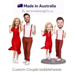 Custom couple bobbleheads figurines in red outfits, shown with a 'Made in Australia' banner above (advertisement)