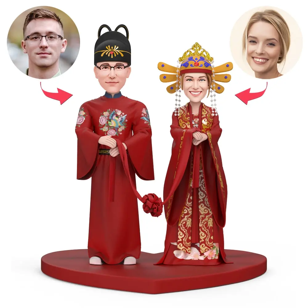 Two cartoon Chinese wedding dolls in red robes holding hands on a red platform, with round headshots of a man and a woman linked by arrows.