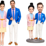 Pair of fashion dolls and miniatures, dressed in coordinated blue blazers and pastel outfits, posed together against a white background.