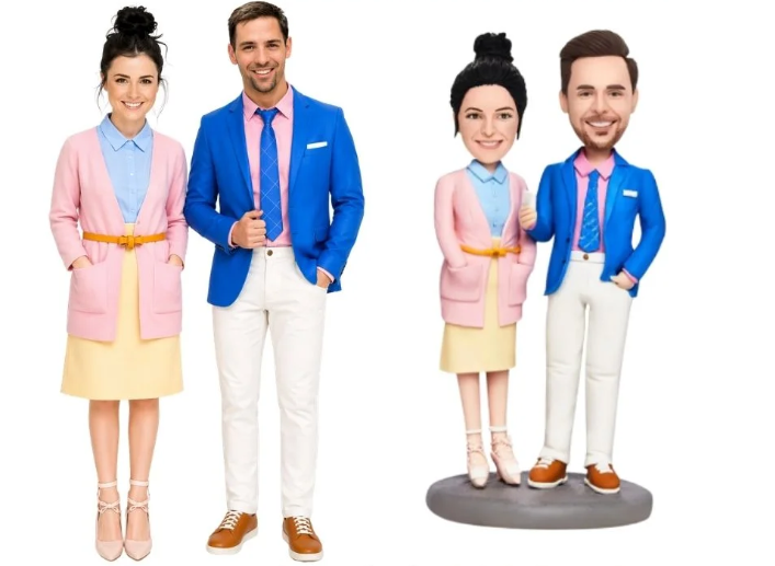 Pair of fashion dolls and miniatures, dressed in coordinated blue blazers and pastel outfits, posed together against a white background.