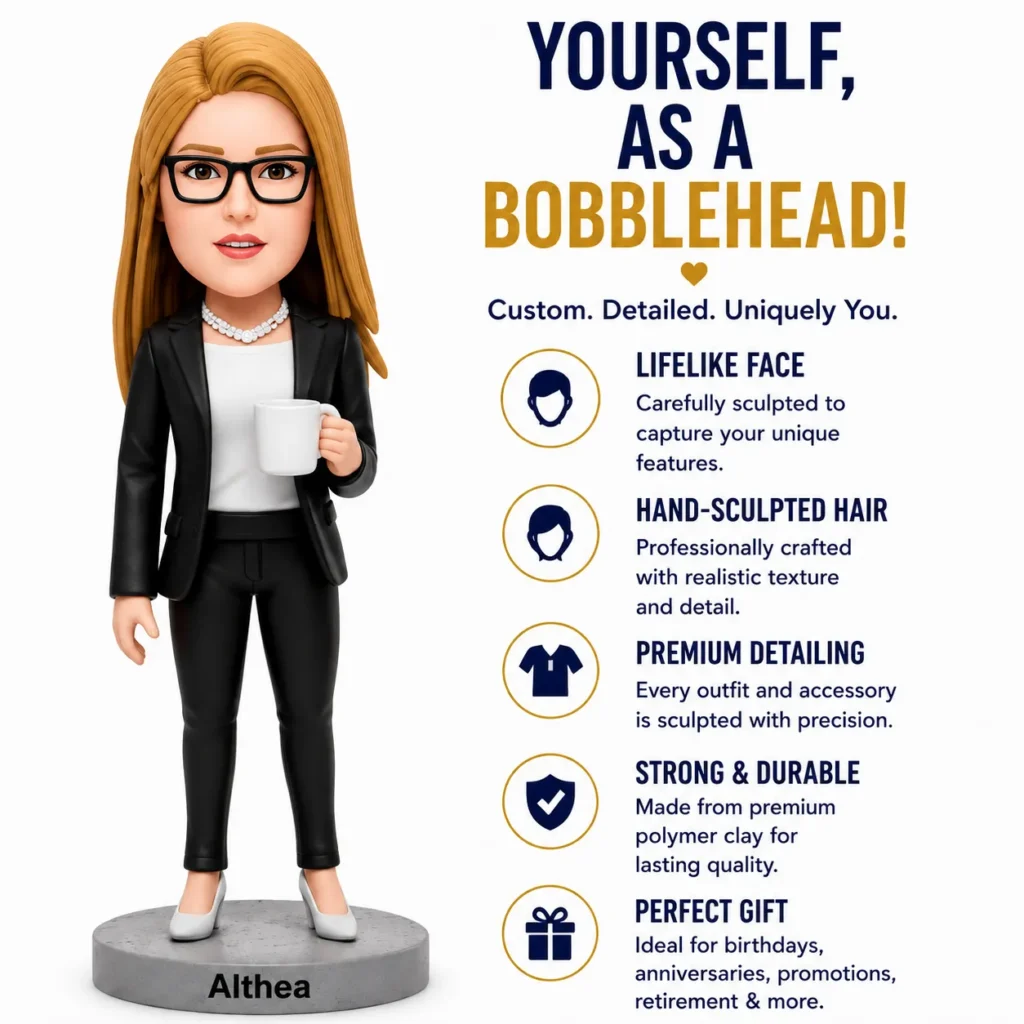 Bobblehead figure of a businesswoman with glasses holding a white mug, standing on a base labeled 'Althea'.