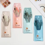 Custom engraved makeup brush set with birth flower and personalized name, ideal wedding gift