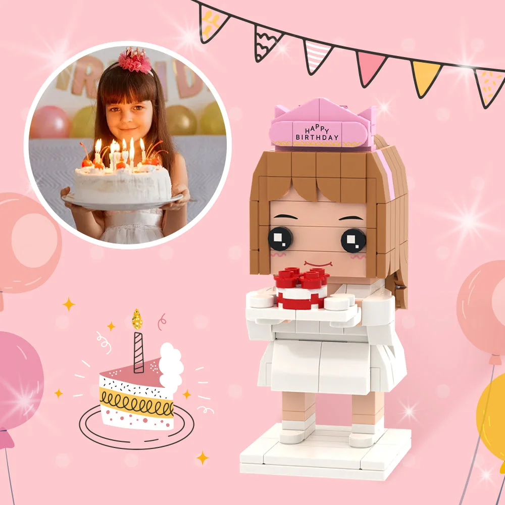 Pink birthday scene with a brick-built girl holding a small cake, festive balloons, and a real girl presenting a cake in a circular photo inset.