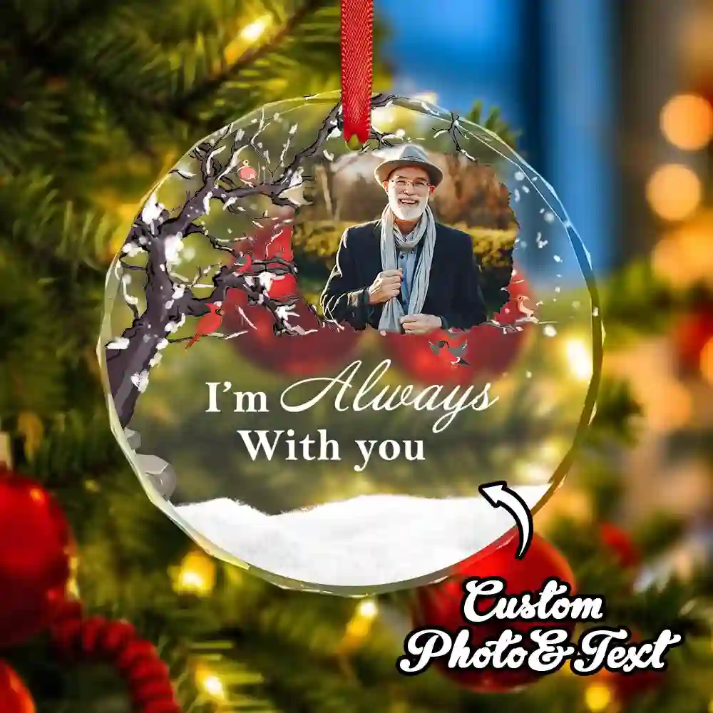 Personalized Christmas ornament with a photo of a man and the message 'I'm Always With you' hanging by a red ribbon.