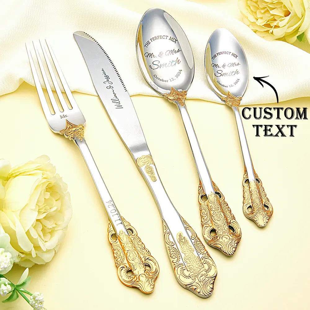 Ornate silver and gold-plated cutlery set with space for custom text on the spoons, wedding-themed invitation style image.