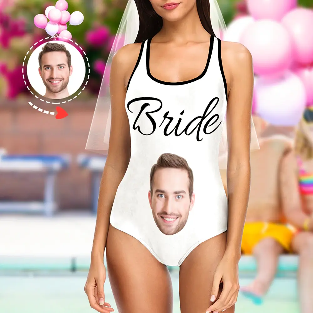 White bridal swimsuit with the word 'Bride'; a man's head photo printed on the belly area in a party setting.