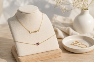personalised-name-necklace-birthstone-bracelet - Personalized Gifts For All Occasions Gift Supplier A personalised name necklace and birthstone bracelet displayed on a jewellery stand
