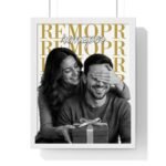 Joyful couple in a frame holding a wrapped gift, with the woman covering the man's eyes and both smiling in a black-and-white photo.