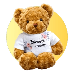 Personalized plush teddy bear wearing a white shirt that reads Elizabeth and 6/13/2023, on a yellow circular background.