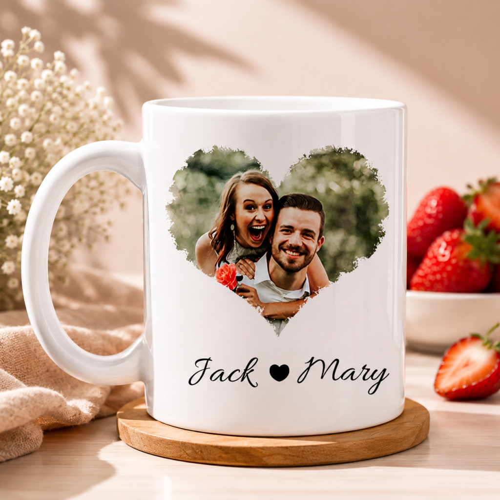 White mug with a heart-shaped photo of a smiling couple and the names Jack and Mary underneath, likely a personalized gift item.