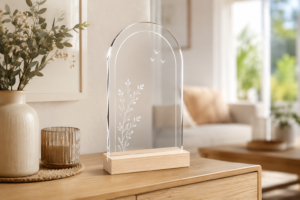 A personalised memorial keepsake engraved with a name and dates, displayed at home