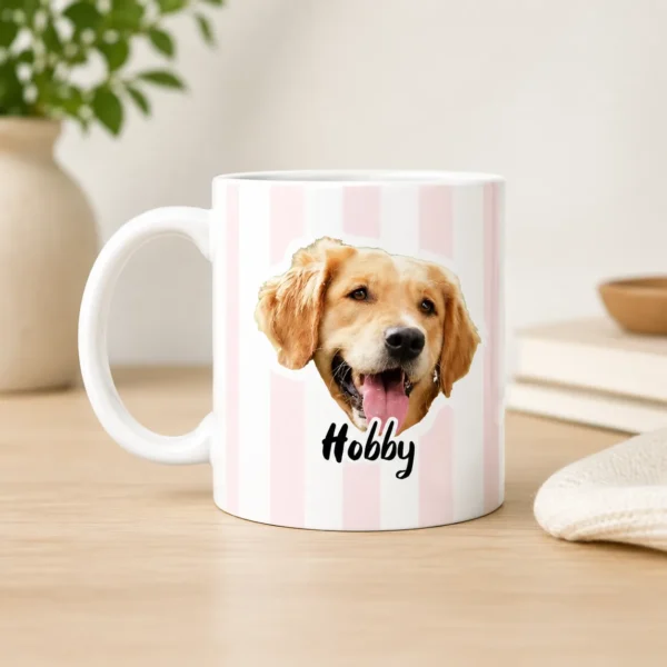 Mug with pink vertical stripes featuring a happy golden retriever head and the name 'Hobby' beneath it