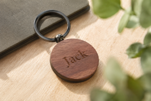 Close-up of a personalised engraved keepsake gift for him on a clean neutral surface